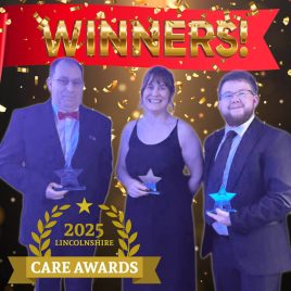 Winners of the Lincolnshire Care Awards 2025 posing together on stage